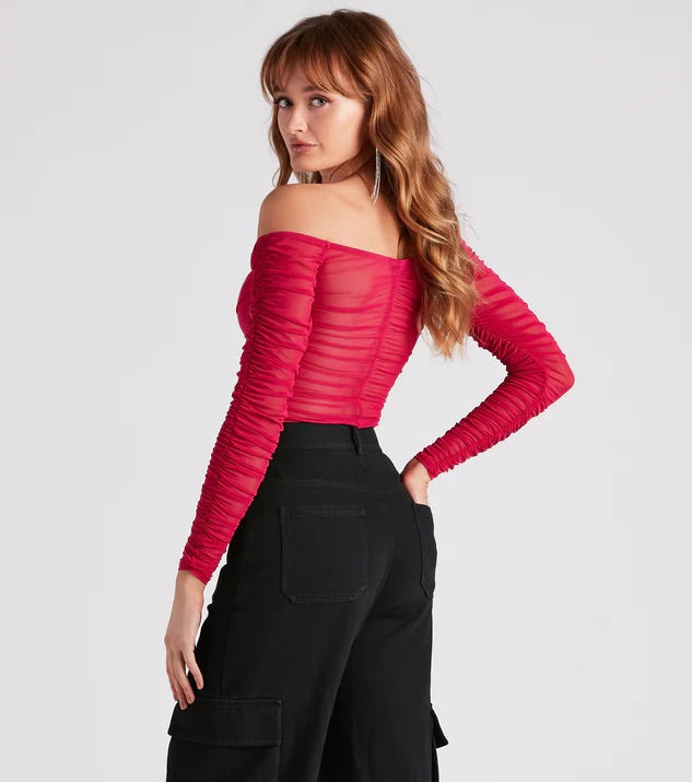 Blusa manga larga con transparencia